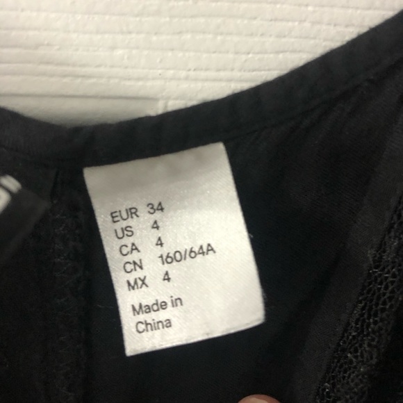 Black Romper with Lace Accents - Picture 3 of 3